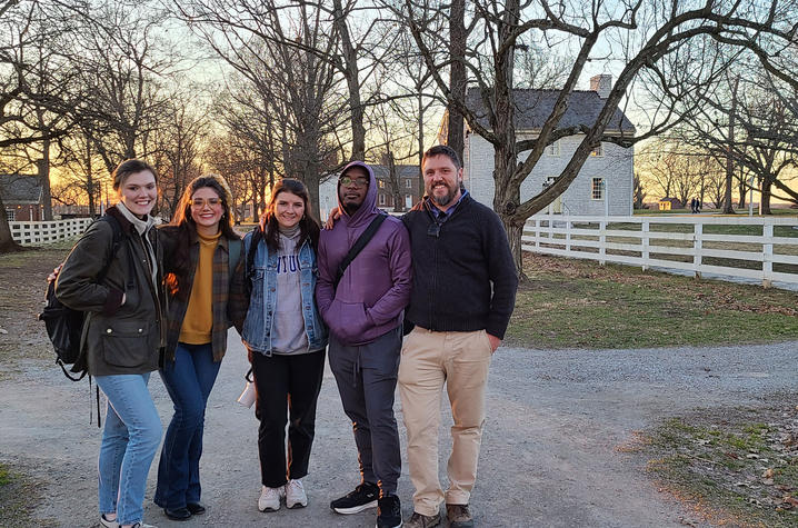 This is a photo of history graduate students at Shaker Village, from left, Taylor Smith, Olivia Dale, McKenna Natzke and Dorian Gray, with Stephen Davis, associate professor of history. Photo provided.