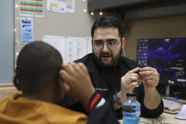 This is a photo of DuJuan Broads, Jr., who is the first in the U.S. to receive the new Flex 34 electrode as a part of his cochlear ear implant on Jan. 9, 2025. Photo by Carter Skaggs | UKphoto