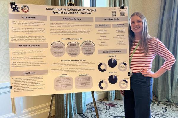 This is a photo of Emma Jones with her dissertation research. Photo provided.
