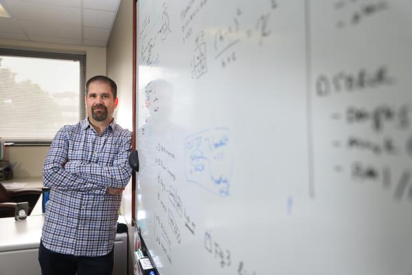 This is a photo of David Fardo, Ph.D., who is supported by the National Institute of Aging, National Institute of Neurological Disorders and Stroke and the National Institute of General Medical Sciences. UK Photo