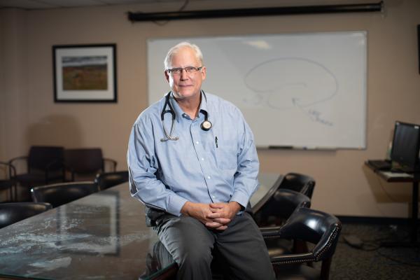 This is a photo of Greg Jicha, M.D., Ph.D., who is supported by the NIH’s National Institute on Aging, which leads research on aging, the aging process and diseases and conditions associated with growing older, in order to extend the healthy, active years of life. UK Photo