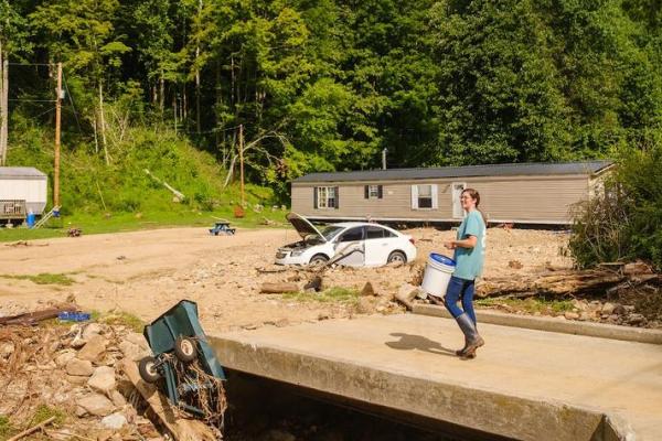 This is a photo of UK Cooperative Extension Agent Dora Centers, who delivered a bucket of cleaning supplies to residents in Eastern Kentucky affected by flooding. Photo by Martin-Gatton CAFE.