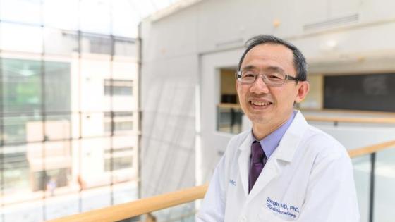 This is a photo of Markey medical oncologist Zhonglin Hao, M.D., Ph.D., who is leading the clinical trial for an mRNA vaccine to treat lung cancer. Photo by Shaun Ring.