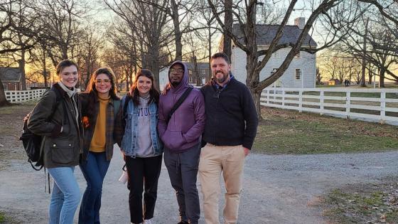 This is a photo of history graduate students at Shaker Village, from left, Taylor Smith, Olivia Dale, McKenna Natzke and Dorian Gray, with Stephen Davis, associate professor of history. Photo provided.