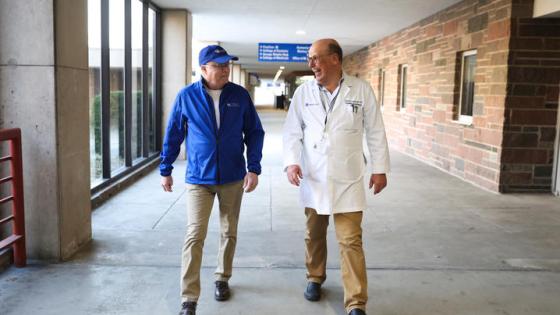 This is a photo of Andy Biermann, left, with Matthias Loebe, M.D., Ph.D., right, at UK Chandler Hospital. Carter Skaggs | UK Photo
