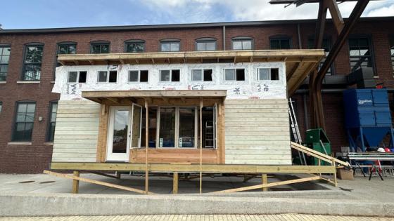 This is a photo of a full-size, modular home prototype for emergency housing , which the College of Design students designed and built . Photo by Meg Mills.