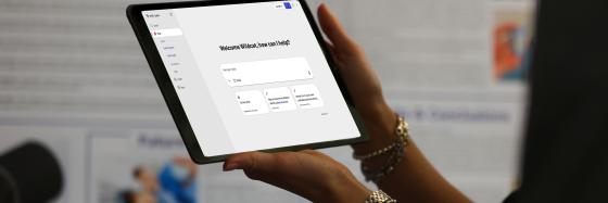 Person holding a tablet. 